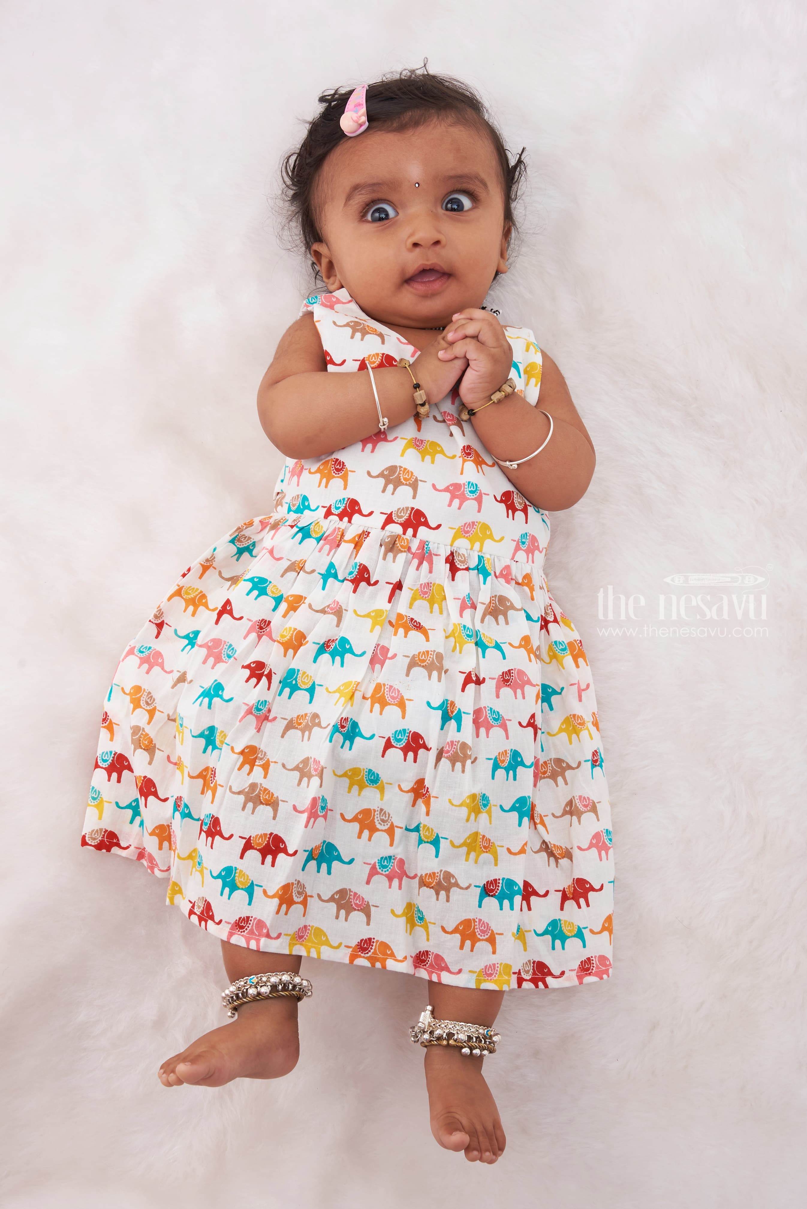 http://www.thenesavu.com/cdn/shop/files/nesavu-elephant-parade-vibrant-elephant-patterned-baby-cotton-frock-baby-cotton-frocks-12-3m-white-cotton-thenesavu-bfj489a-12-shop-the-look-trendy-baby-frocks-fashionable-infant-dres_9ce34503-5ce0-467b-bc87-d9d616331ef4.jpg?v=1699599492