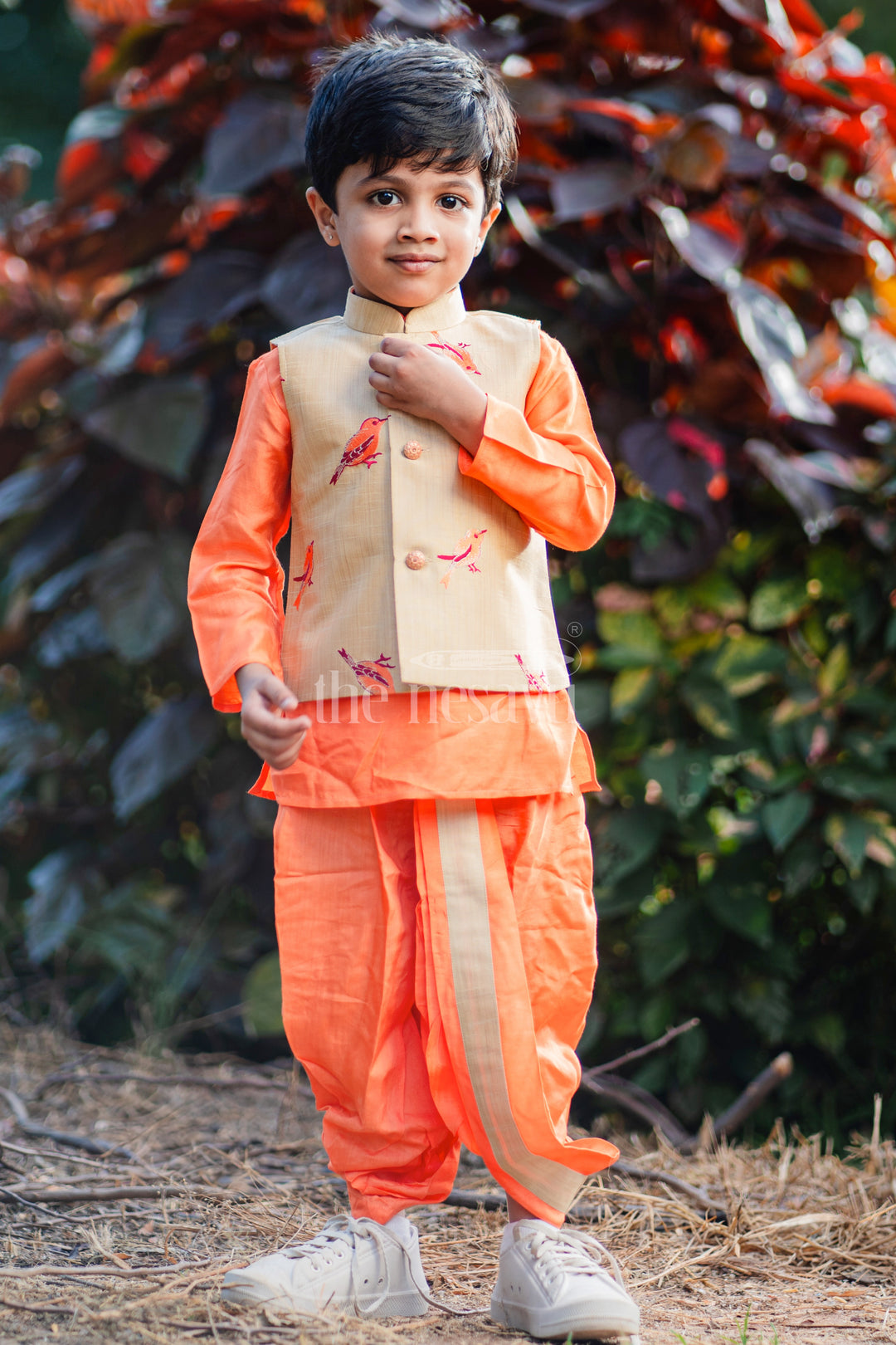 Boys Orange Silk Blend Dhoti Set with Embroidered Bird Motif Jacket for Traditional Gatherings