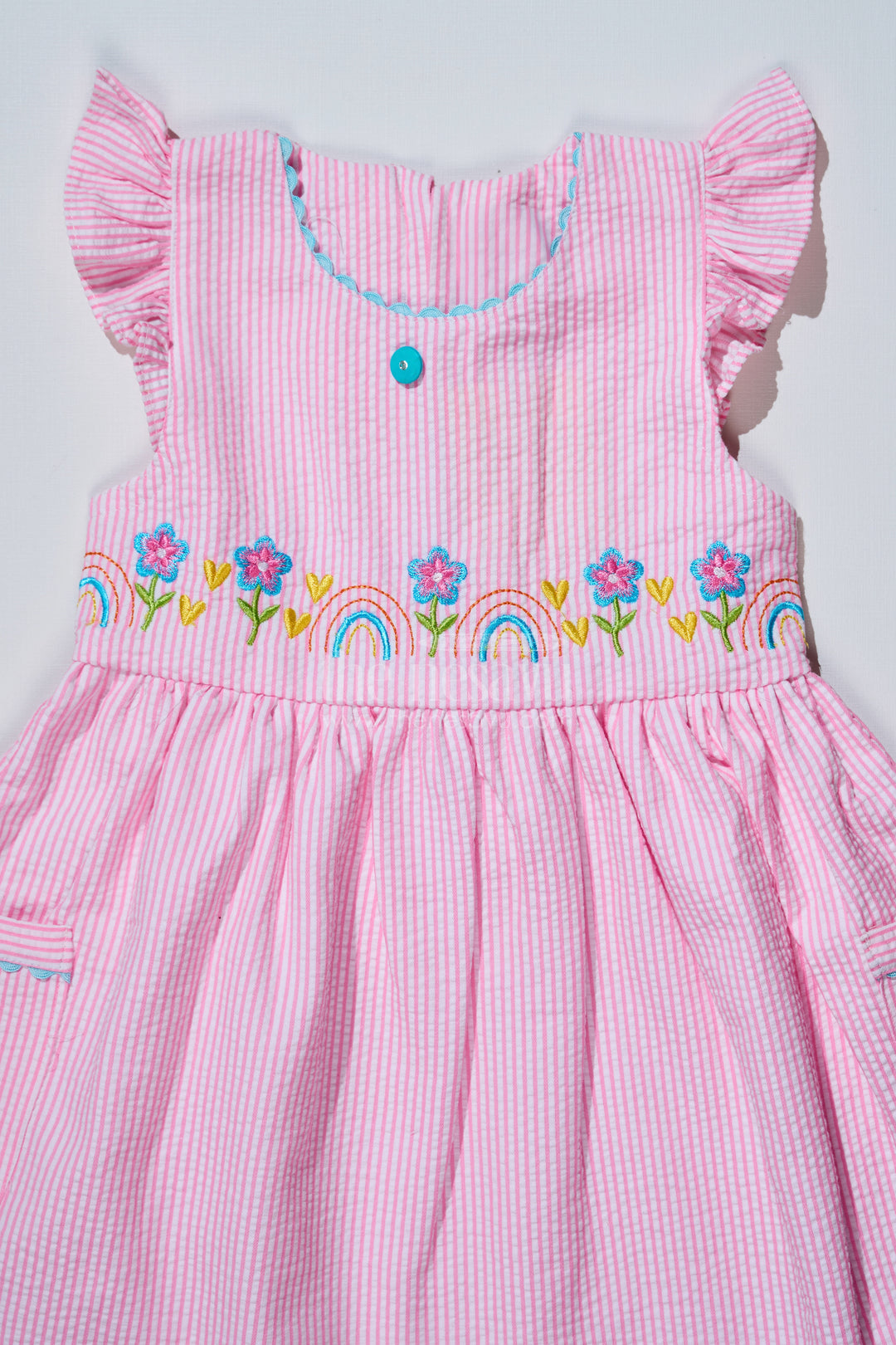 Baby Girls Pink Colour Frock in Seer Sucker Cotton with Embroidery and Ruffled Sleeves