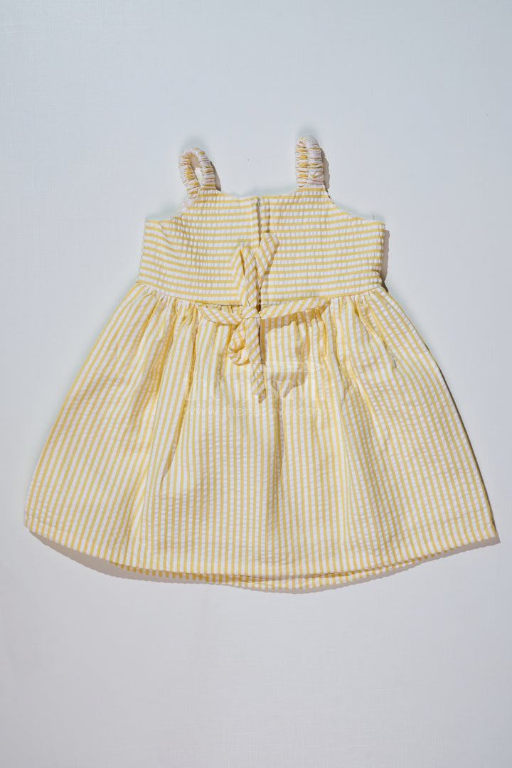 Baby Girls Lemon Yellow Dress in Seer Sucker Cotton with Floral Embroidery and Bow Detail