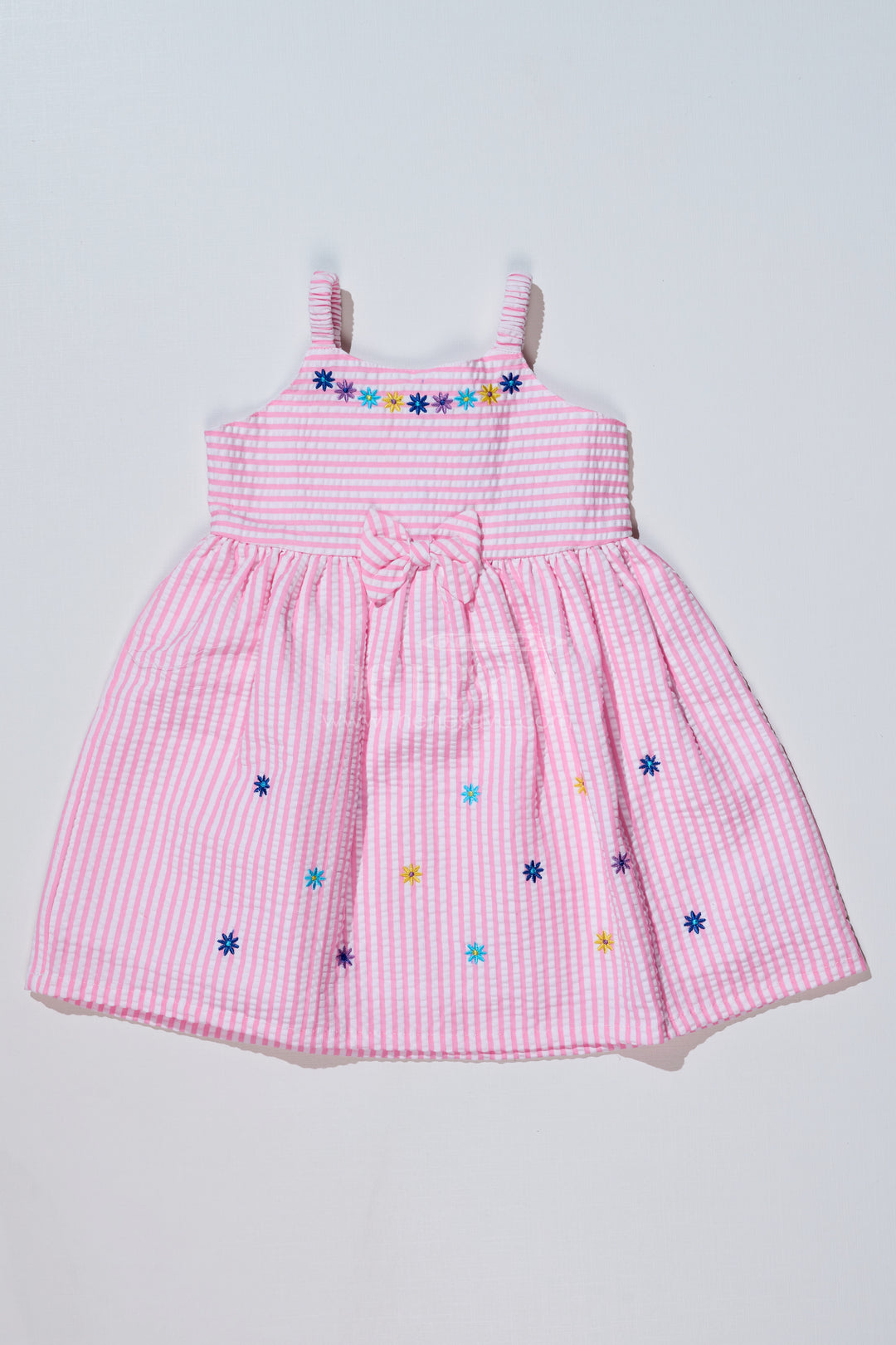 Baby Girls Pink Cotton Frock in Seer Sucker Fabric with Floral Embroidery and Bow Accent