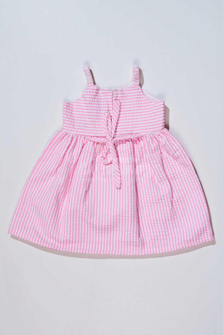 Baby Girls Pink Cotton Frock in Seer Sucker Fabric with Floral Embroidery and Bow Accent