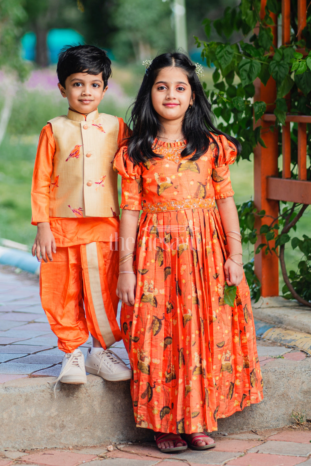 Boys Orange Silk Blend Dhoti Set with Embroidered Bird Motif Jacket for Traditional Gatherings