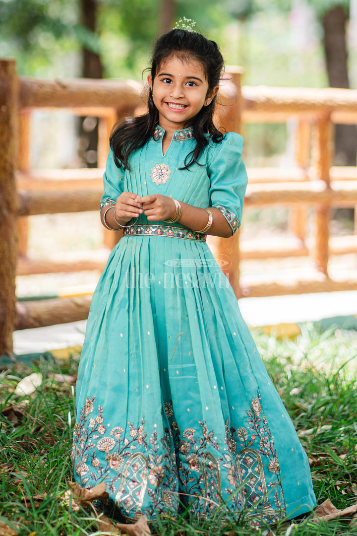 Girls Teal Party Gown with Intricate Embroidery and Floral Borders for Special Occasions