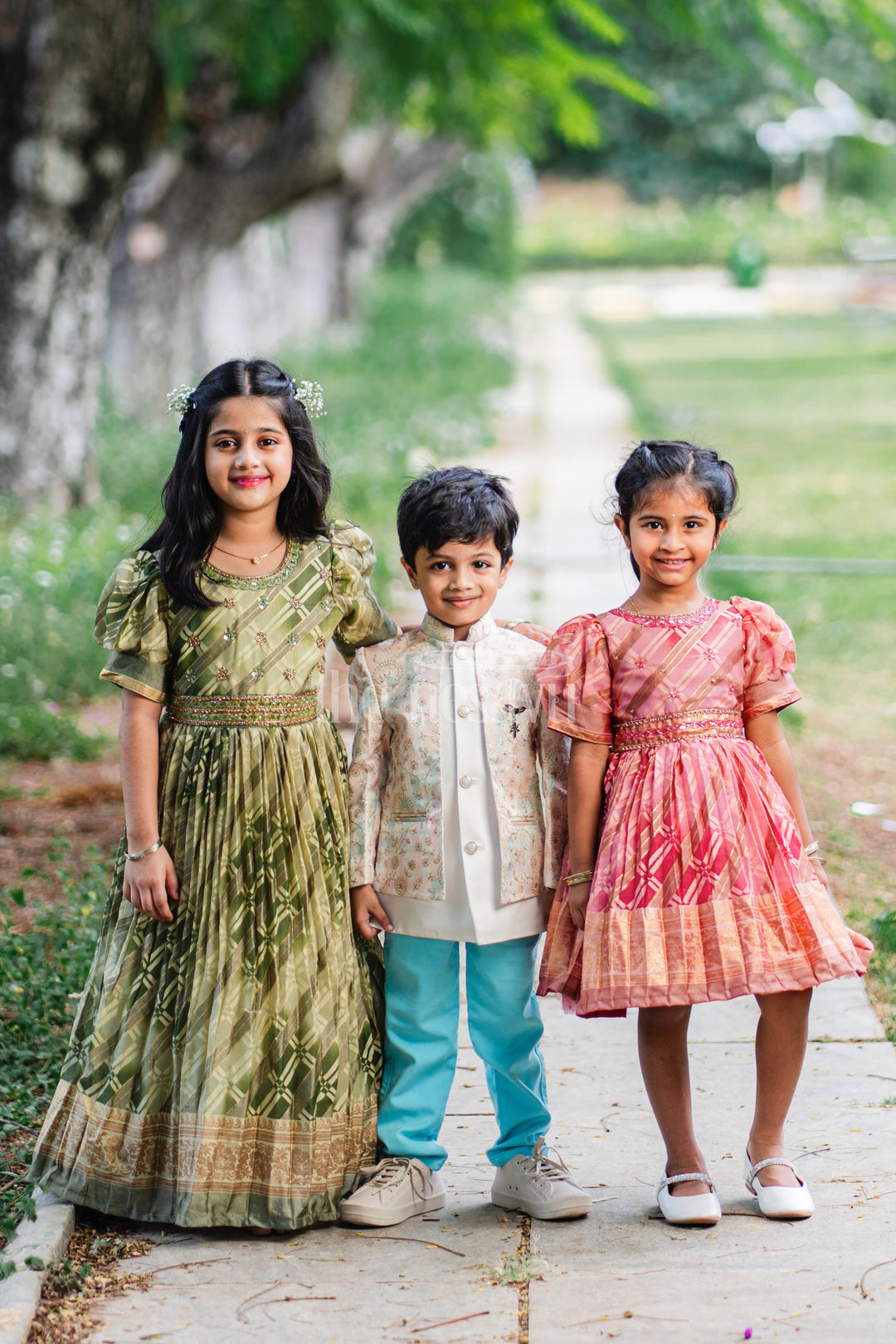 Girls Party Gown in Green Tissue Silk with Golden Floral Motifs and Pleated Full-Length Skirt