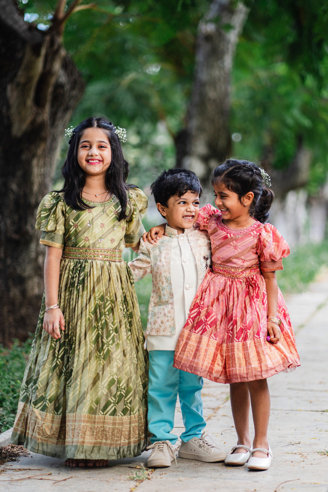 Girls Party Gown in Green Tissue Silk with Golden Floral Motifs and Pleated Full-Length Skirt