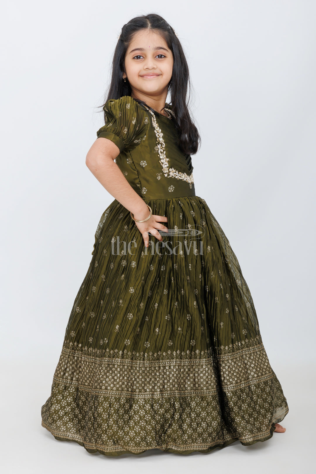 Olive Green Girls Silk Gown with Foil Print and Puff Sleeves for Heavy Party Wear