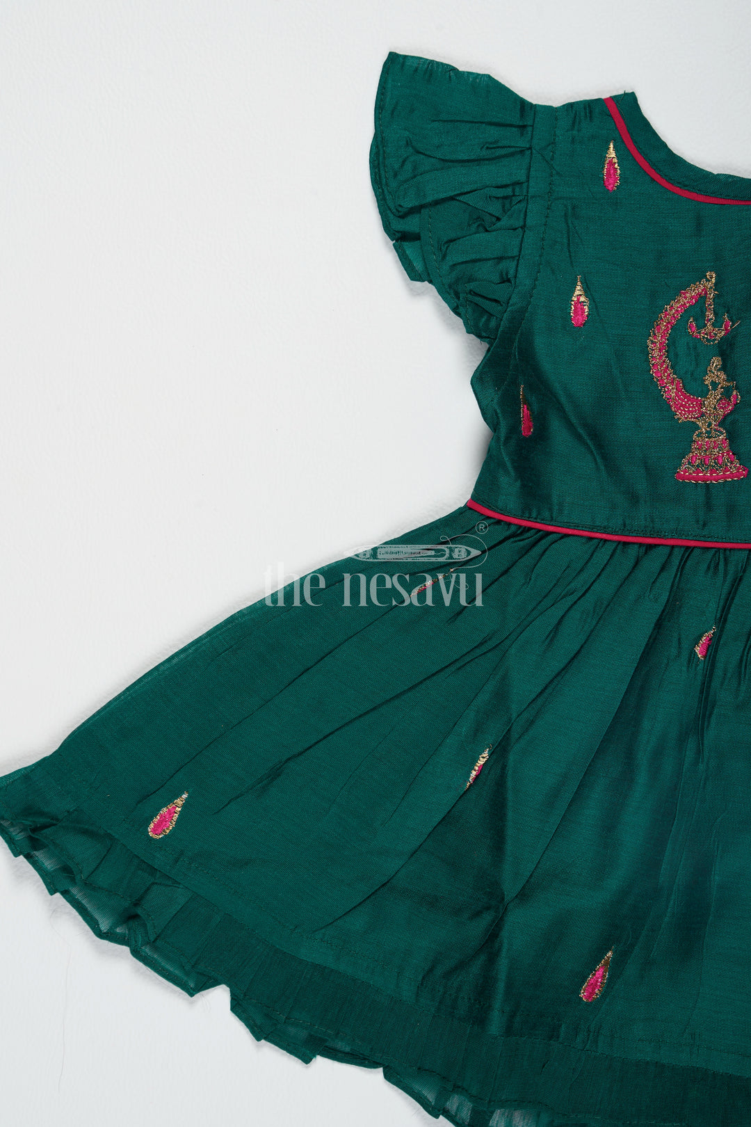 Green Chanderi Cotton Frock with Earring Embroidery for Girls – Traditional Attire for Festive Occasions