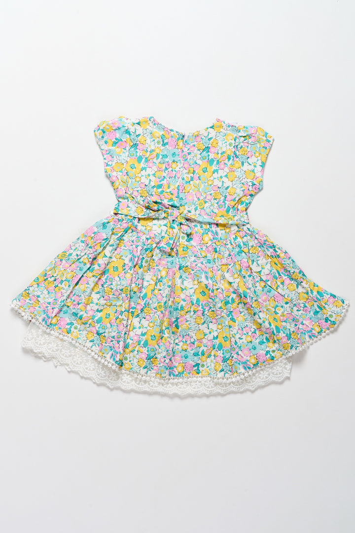 Vibrant Girls Cotton Frock with Multicolor Floral Print and Lace Hem – Frock for Reception