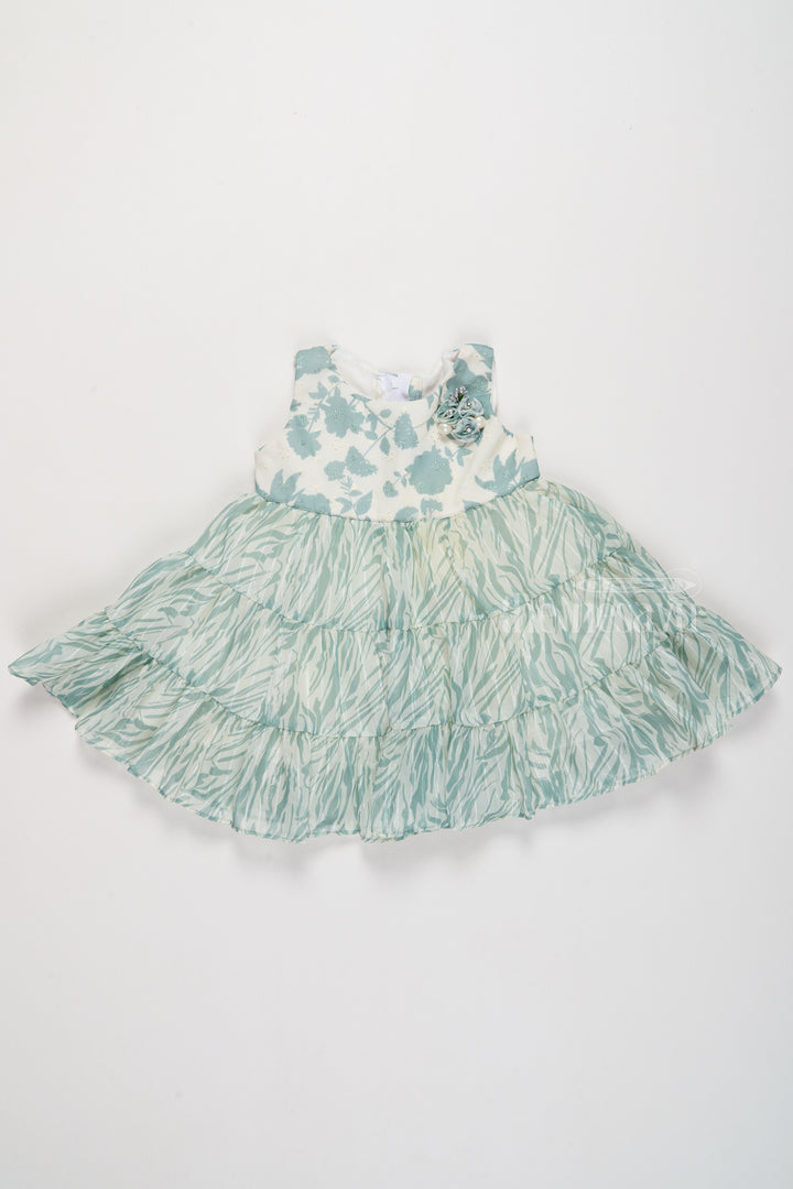 Elegant Girls Party Wear Fancy Frock in Green with Tiered Layers and Floral Embellishments