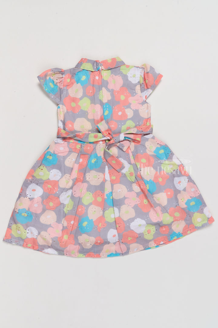 Simple Cotton Frock for Girls with Bright Floral Patterns and Waist Belt