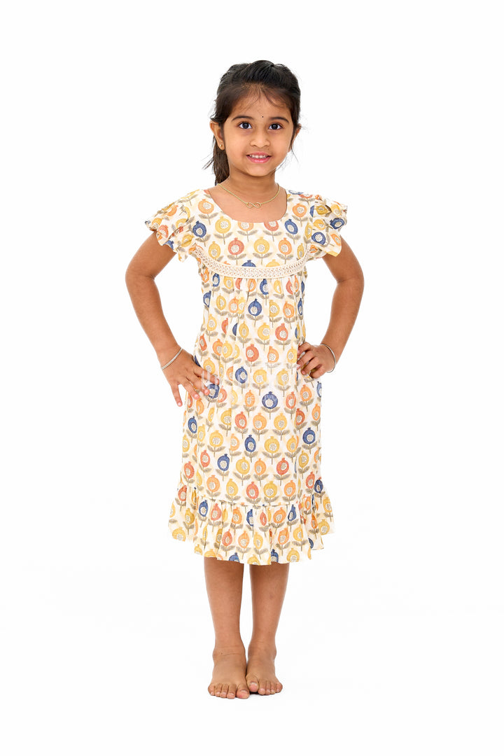 Stylish Girls Cotton Daily Wear Dress with Vibrant Floral Pattern and Ruffle Details