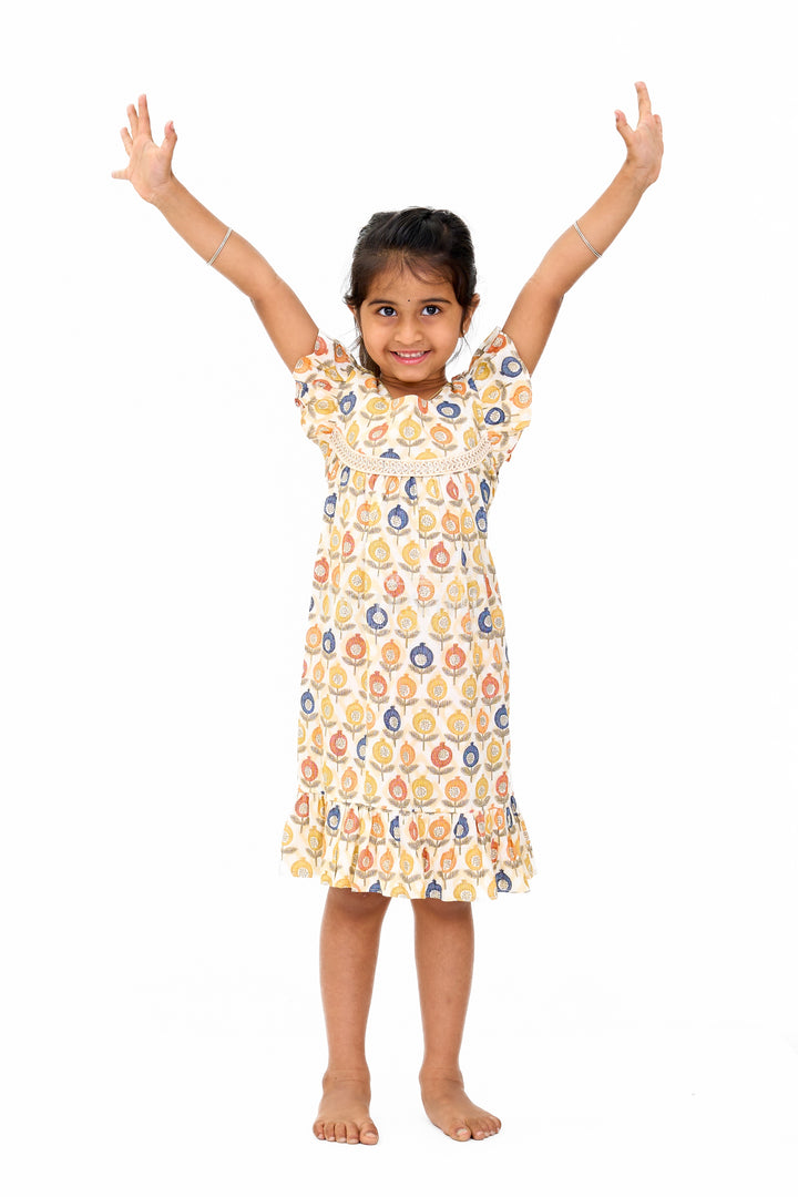 Stylish Girls Cotton Daily Wear Dress with Vibrant Floral Pattern and Ruffle Details