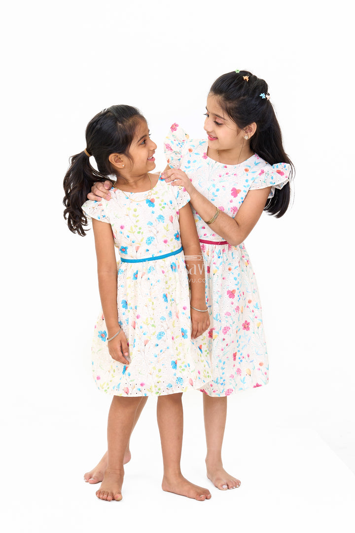 Girls Cotton Fancy Frock with Embroidered Floral Patterns and Flutter Sleeves