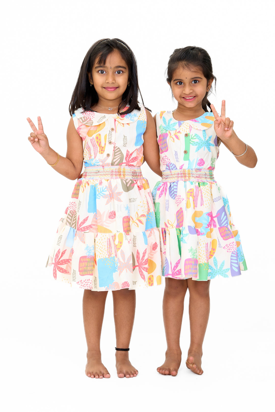 Girls Cotton Sleeveless Frock with Vibrant Prints and Peter Pan Collar