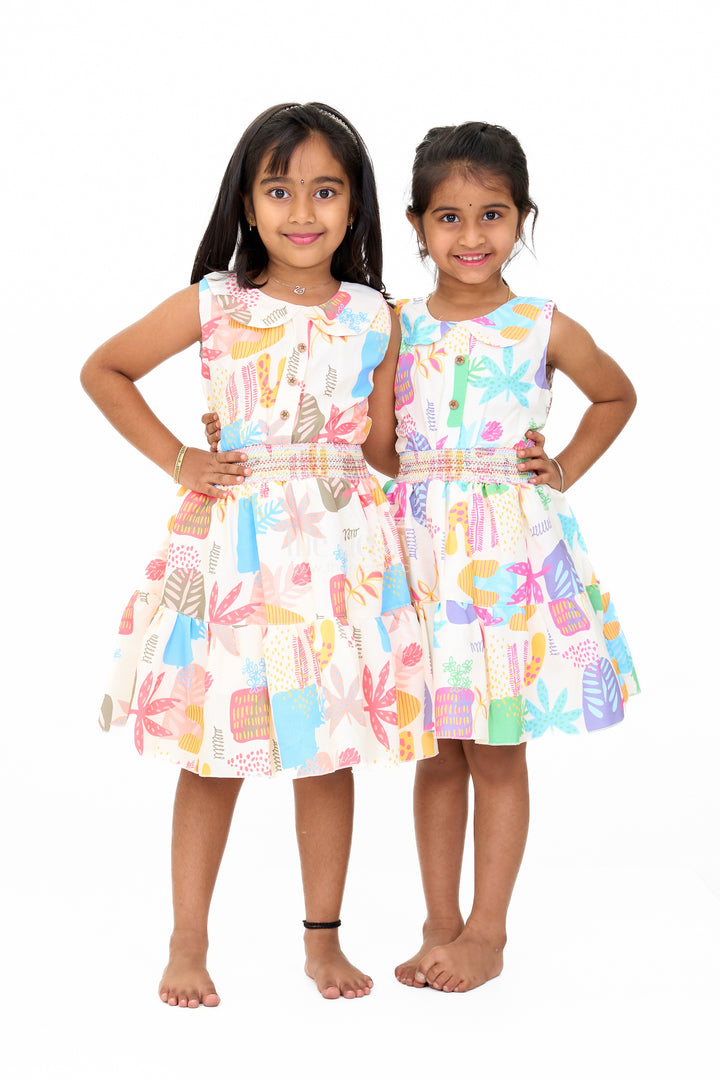 Girls Cotton A-Line Frock with Multicolor Prints and Smocked Waist