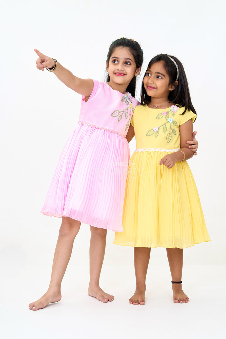 Girls Poly Georgette Frock in Sunshine Yellow with Floral Embellishments and Pleats