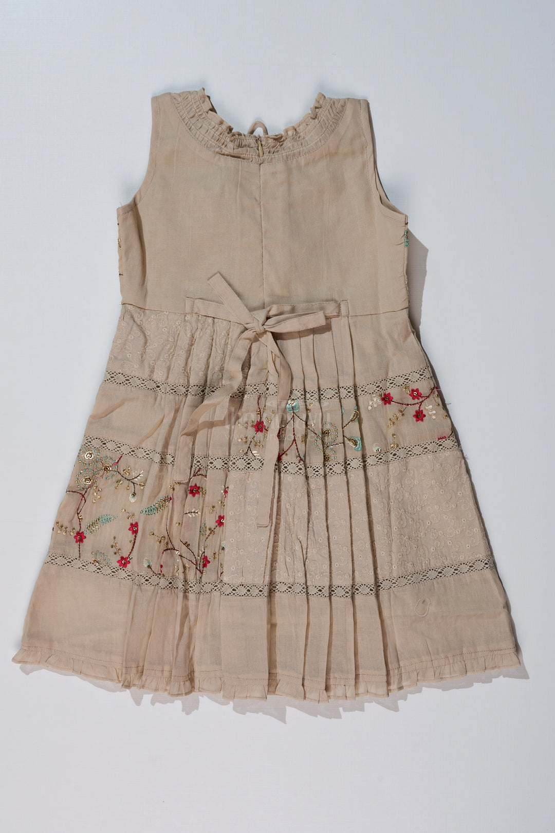 Girls Cream Frock for Kids with Floral Embroidery and Pleats for Everyday Elegance