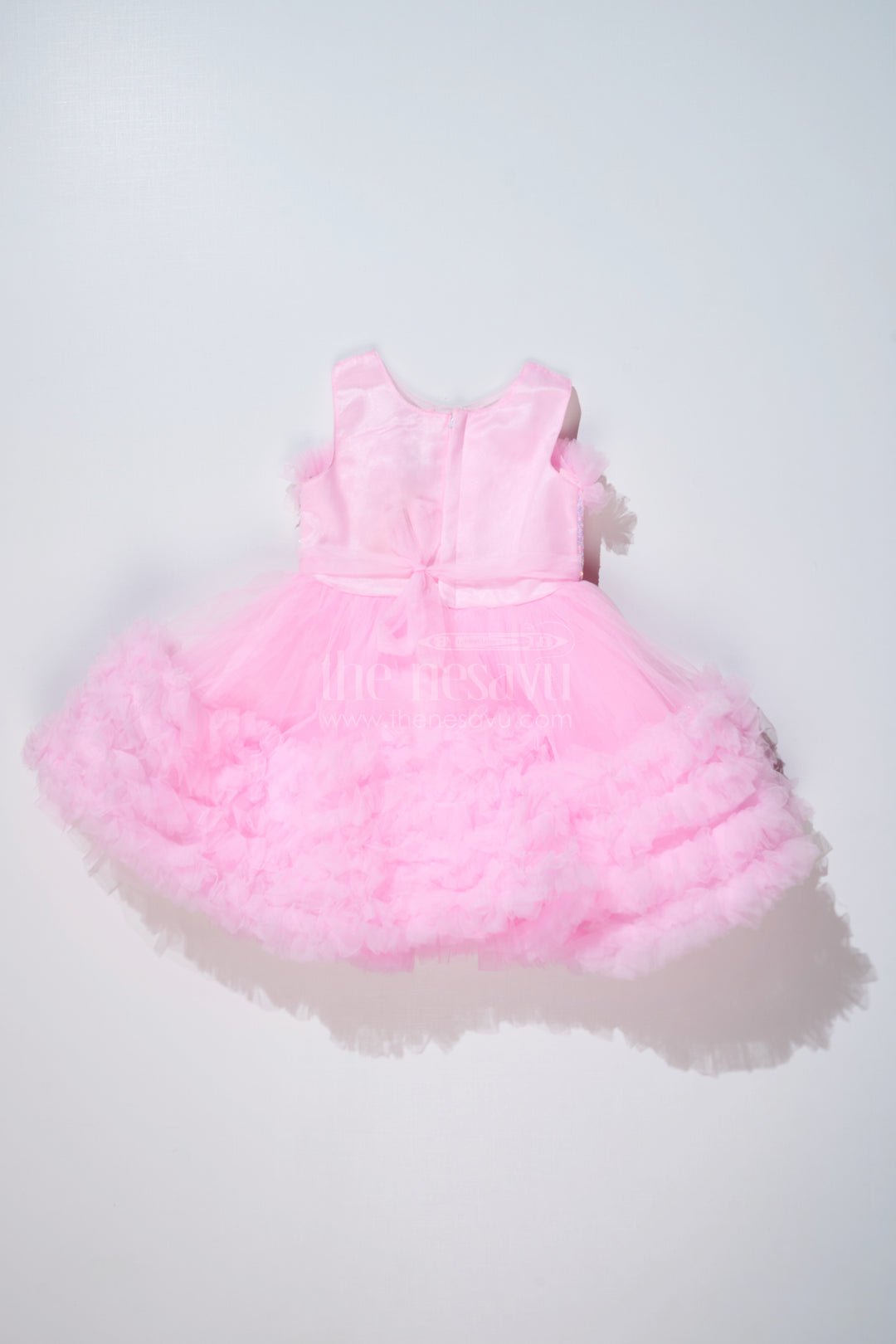 Adorable Pink Net Party Dress for Girls with Ruffled Layers and Sparkling Bow