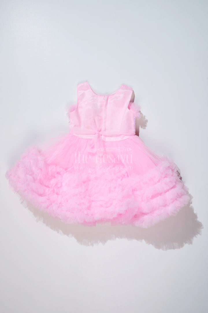 Adorable Pink Net Party Dress for Girls with Ruffled Layers and Sparkling Bow