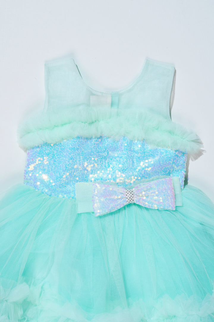 Elegant Green Net Dinner Dress for Girls with Ruffles and a Sequin Bow