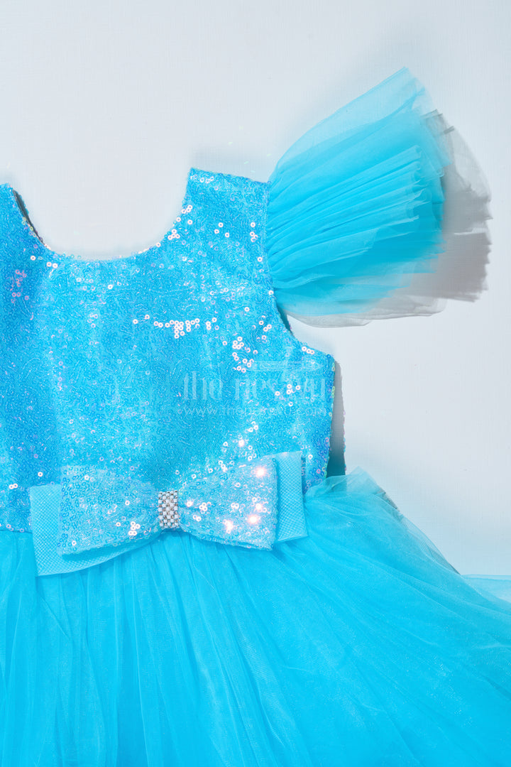 Girls Blue Party Dress with Sequin Bodice and High-Low Ruffled Hem