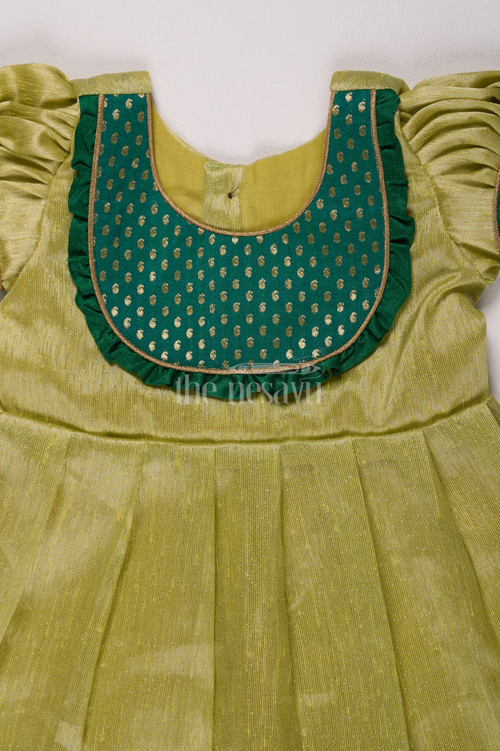 Elegant Light Green Frock Pattu for Girls with Silver Tissue and Golden Yoke