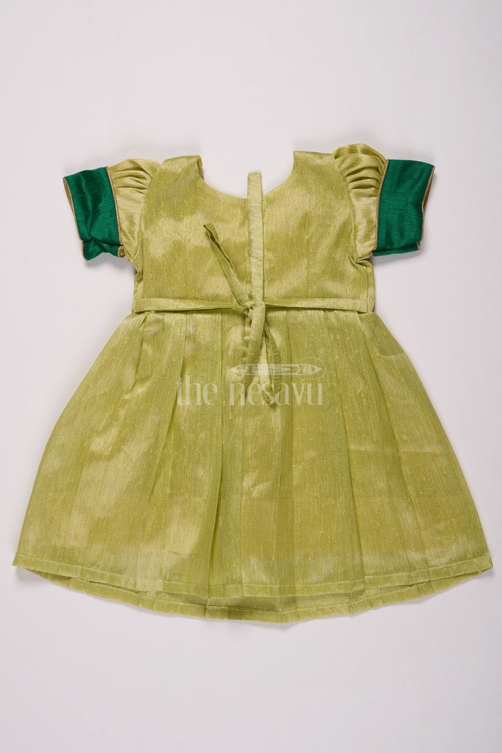 Elegant Light Green Frock Pattu for Girls with Silver Tissue and Golden Yoke