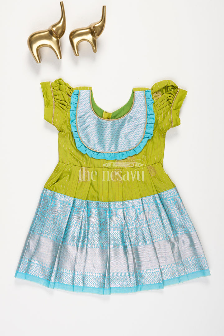 Girls Green Kanchipuram Silk Frock with Blue Zari Border and Puff Sleeves