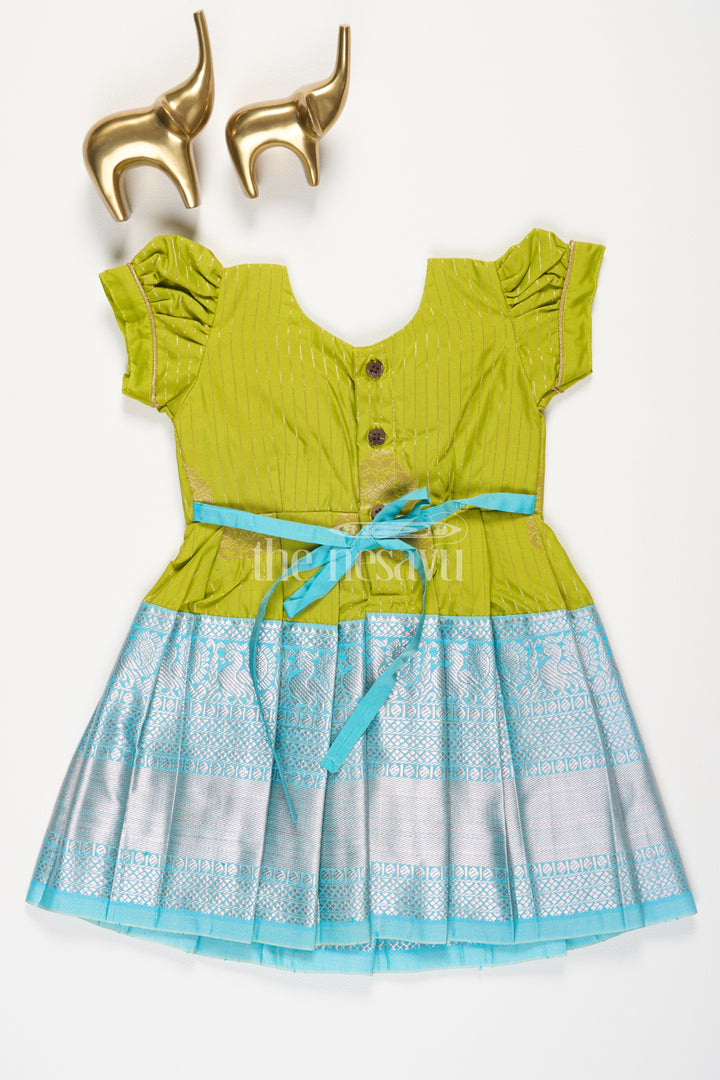 Girls Green Kanchipuram Silk Frock with Blue Zari Border and Puff Sleeves