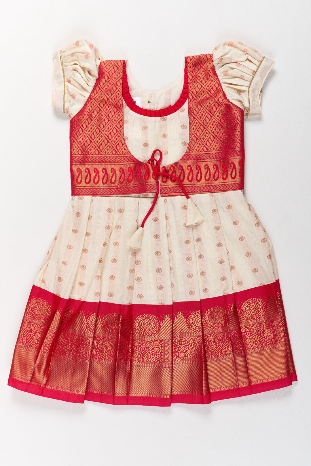 Graceful Cream and Red Pattu Pavadai for Girls with Golden Zari Accents