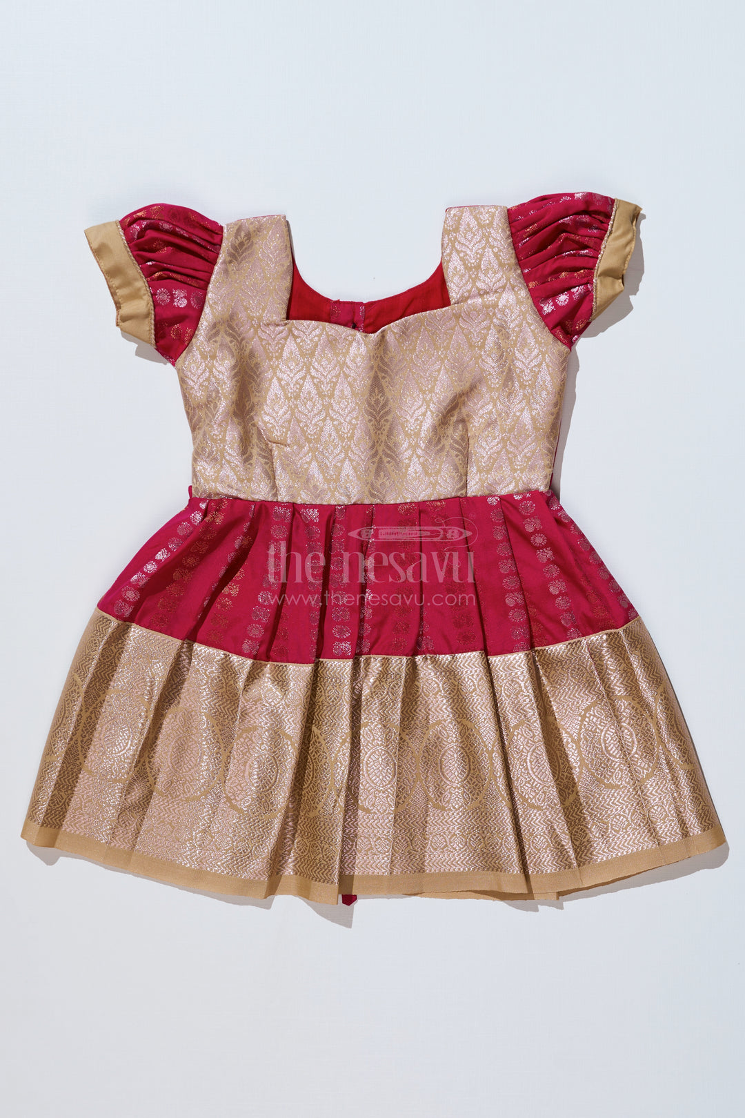 Girls Gold and Red Pattu Pavadai with Intricate Zari Border and Elegant Pleated Design