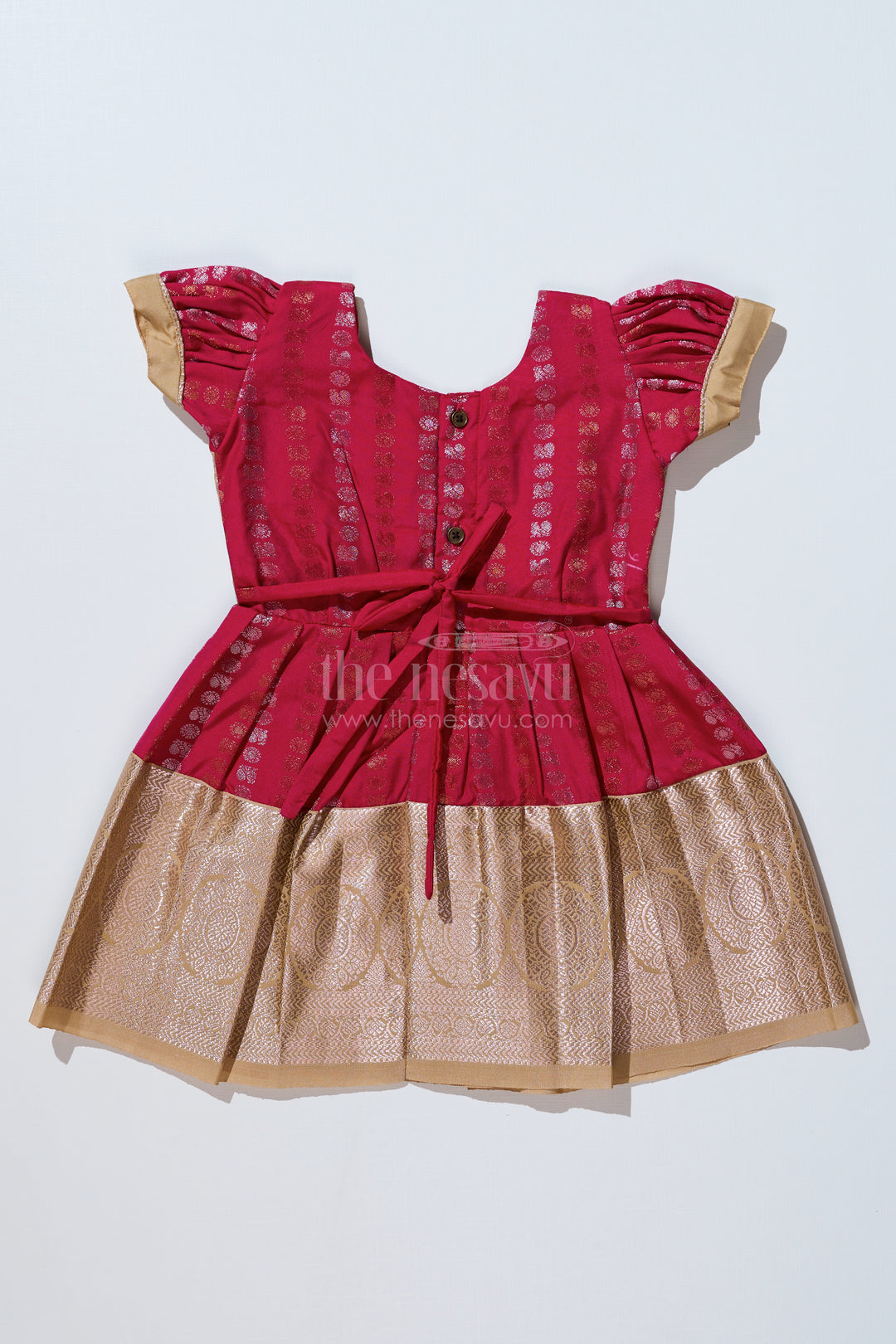 Girls Gold and Red Pattu Pavadai with Intricate Zari Border and Elegant Pleated Design