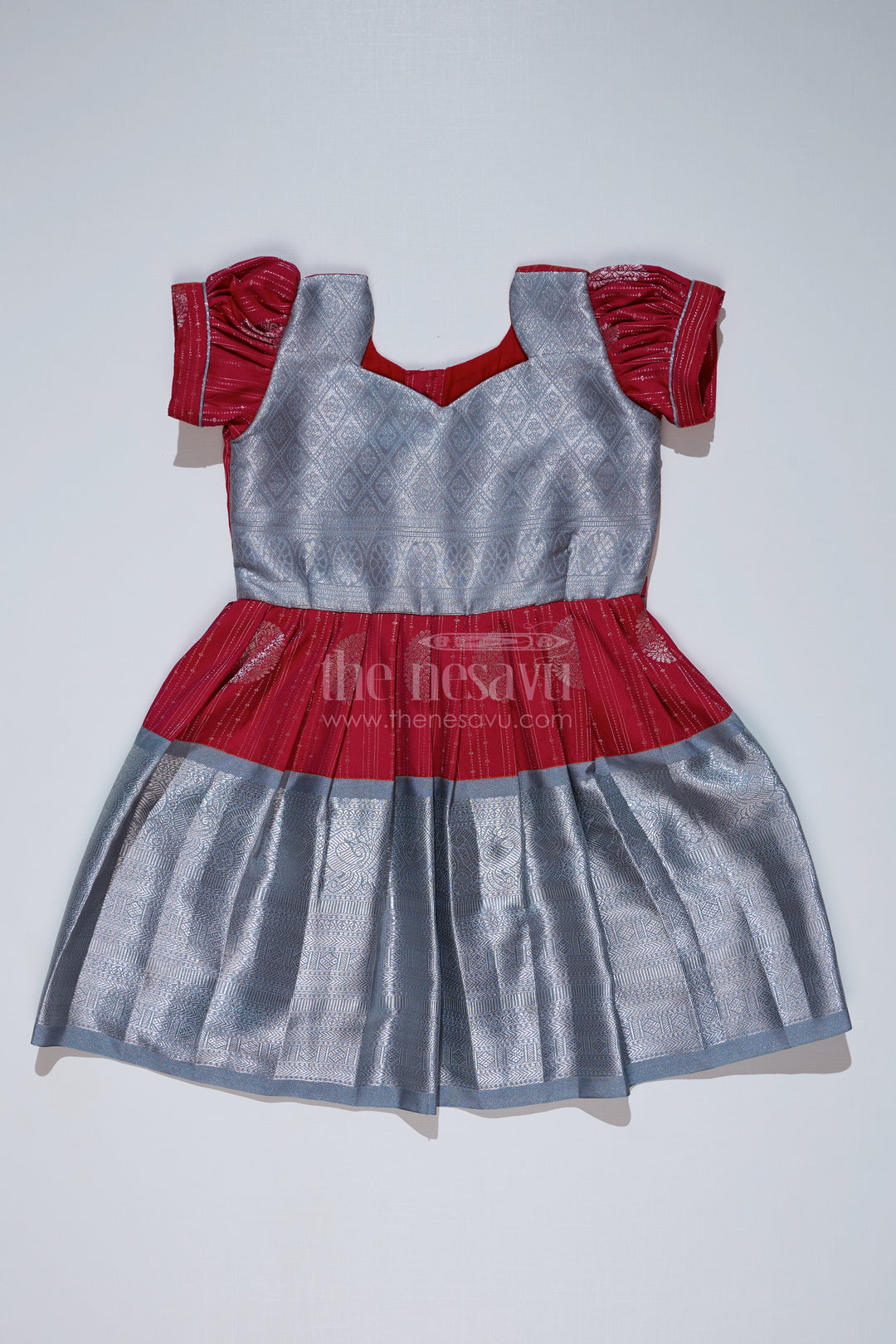 Girls Red and Silver Pattu Pavadai with Zari Border and Elegant Pleated Skirt Available Online