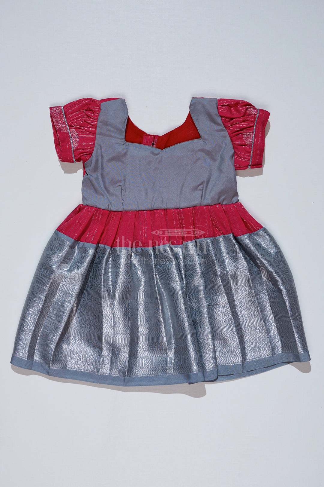 Girls Red and Silver Pattu Pavadai with Zari Border and Elegant Pleated Skirt Available Online