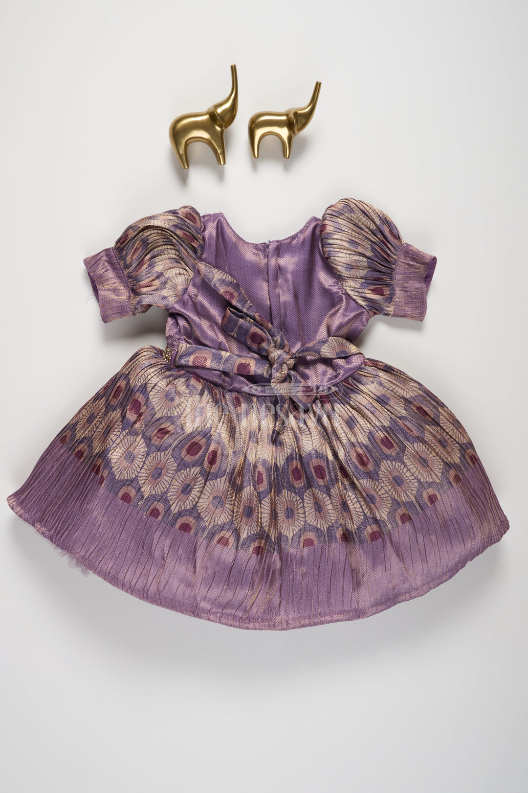 Girls Lavender Silk Frock with Puff Sleeves and Regal Peacock Feather Pattern