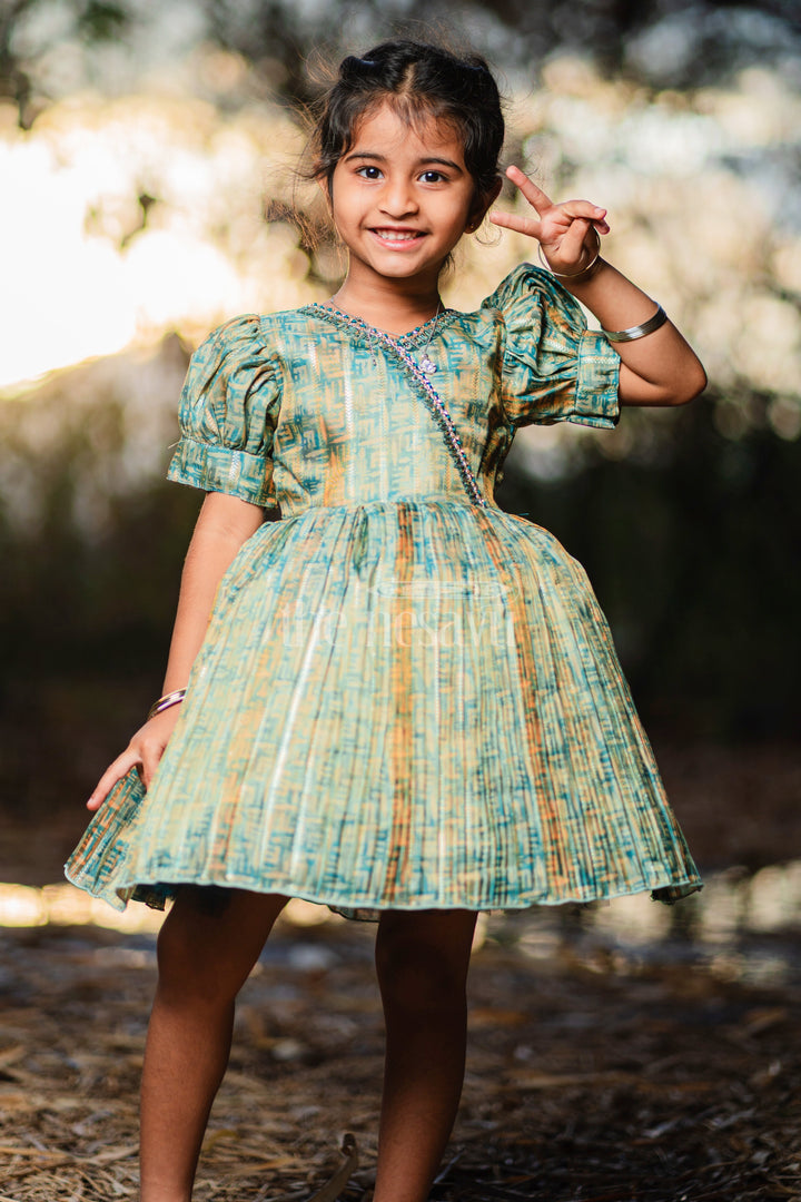 Baby Fancy Frock in Green Tissue Organza with Puff Sleeves and Silver Embellishments