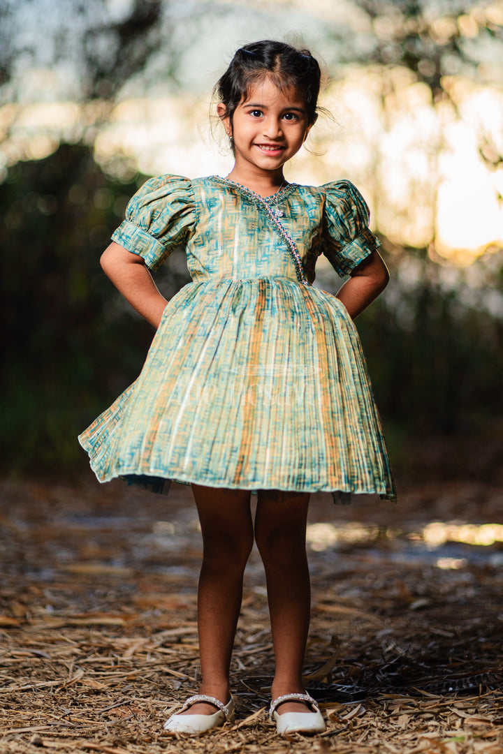 Baby Fancy Frock in Green Tissue Organza with Puff Sleeves and Silver Embellishments