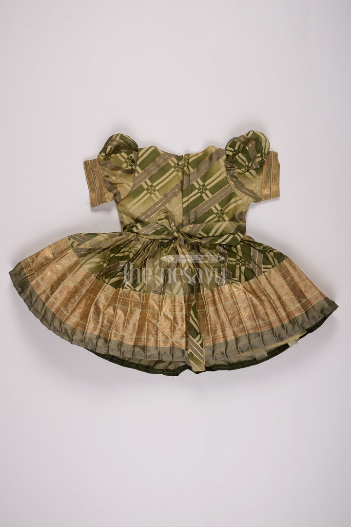 Girls Fancy Frock in Green Tissue Silk with Floral Embellishments and Short Pleated Skirt