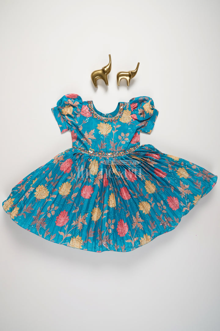 Girls Blue Floral Silk Party Frock with Puff Sleeves and Embellished Waistline