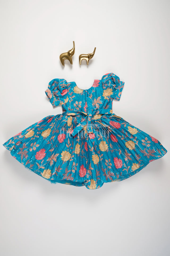 Girls Blue Floral Silk Party Frock with Puff Sleeves and Embellished Waistline