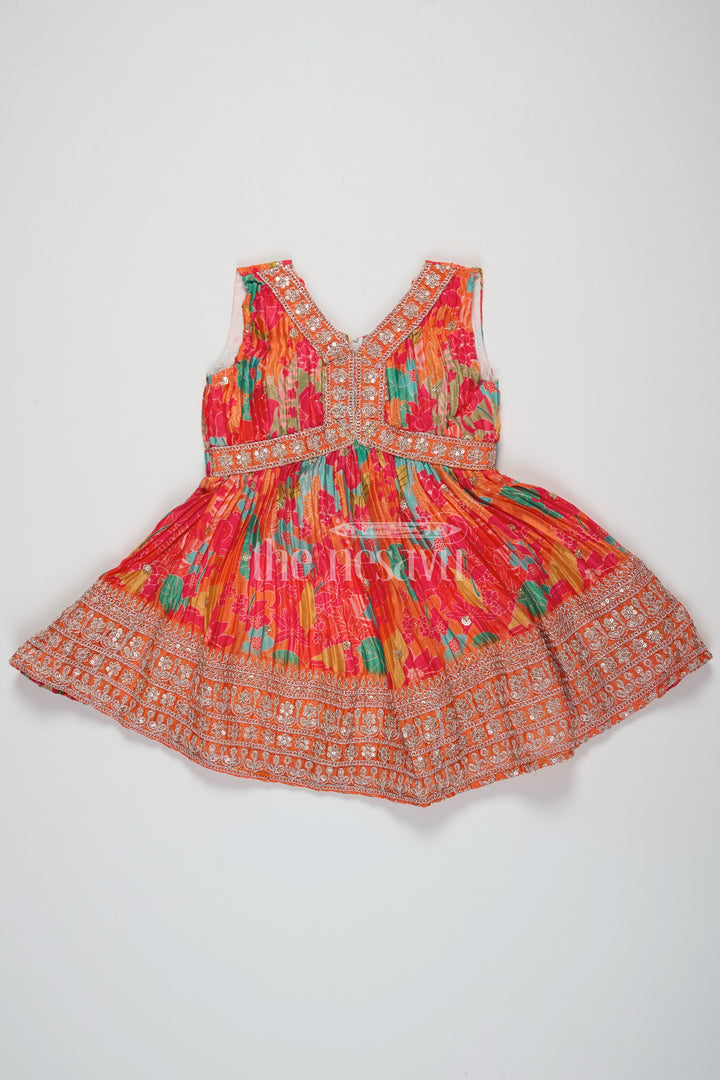 Orange Silk Party Frock for Girls – Traditional Pattu Dress with Floral Prints and Sequins