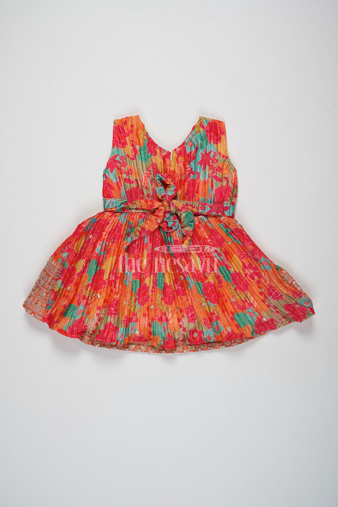 Orange Silk Party Frock for Girls – Traditional Pattu Dress with Floral Prints and Sequins