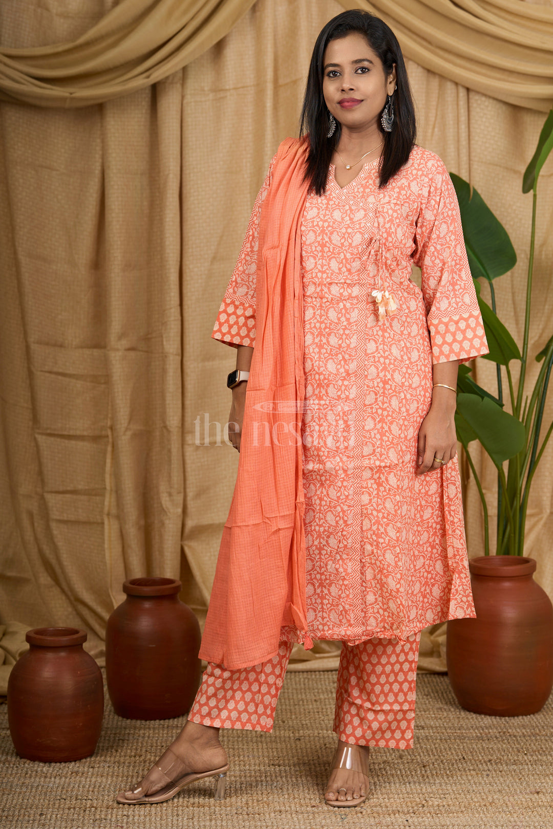 Peach Jaipuri Block Printed Cotton Flared Suit Set with Tassel Detailing on Neckline for Women