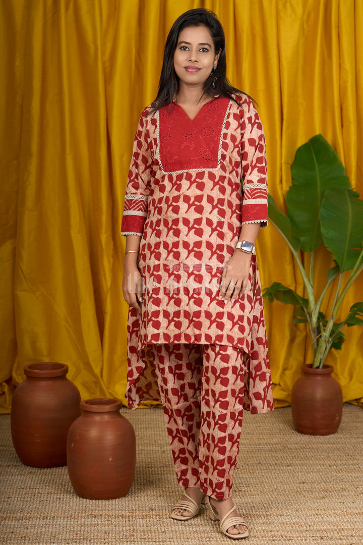 Maroon Batik Printed Cotton Flared Kurtha with Lace Detailing and Comfortable Fit for Women