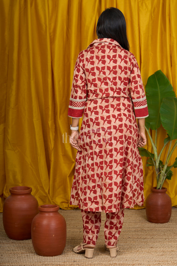 Maroon Batik Printed Cotton Flared Kurtha with Lace Detailing and Comfortable Fit for Women