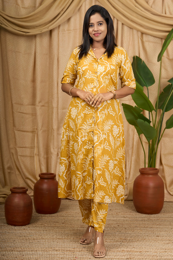 Nesavu Mustard Yellow Cotton Flared Kurtha with White Botanical Print for Casual and Festive Wear