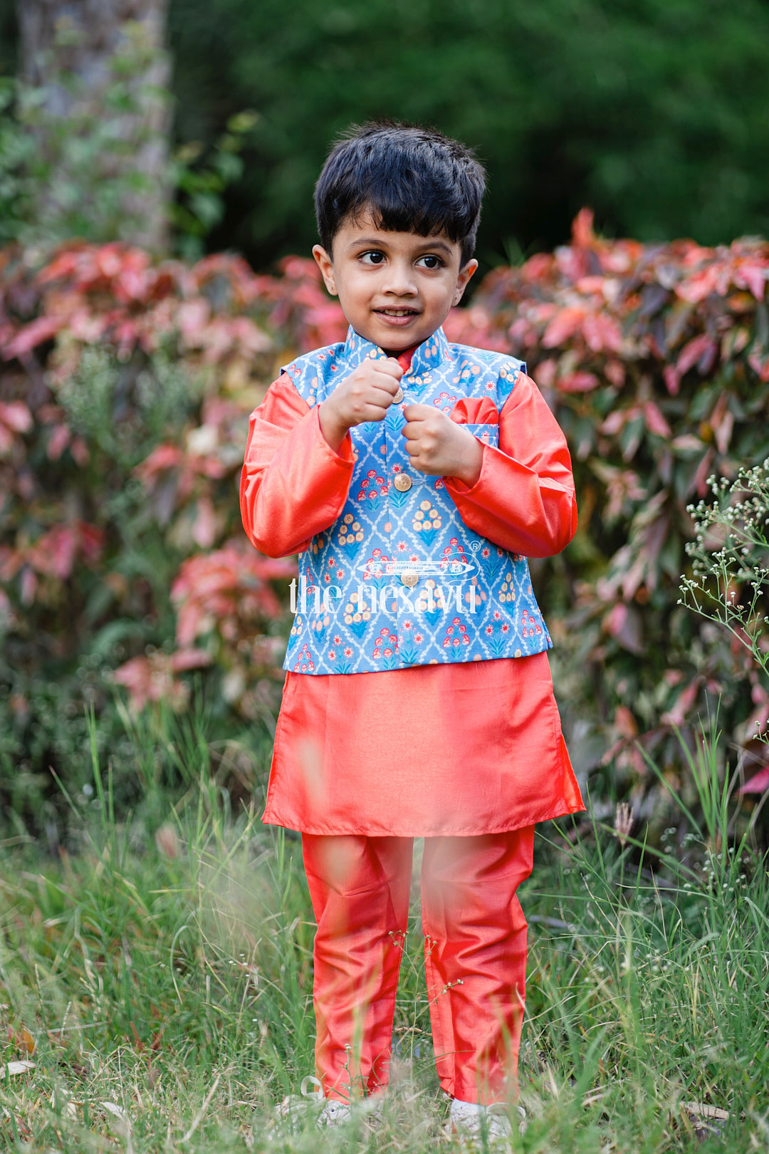 The Nesavu Boys Jacket Sets Adorable Orange Boys Kurta Set With Blue Floral Printed OverCoat Nesavu Premium Festive Kurta Set For Boys | Boys Kurta Online | The Nesavu