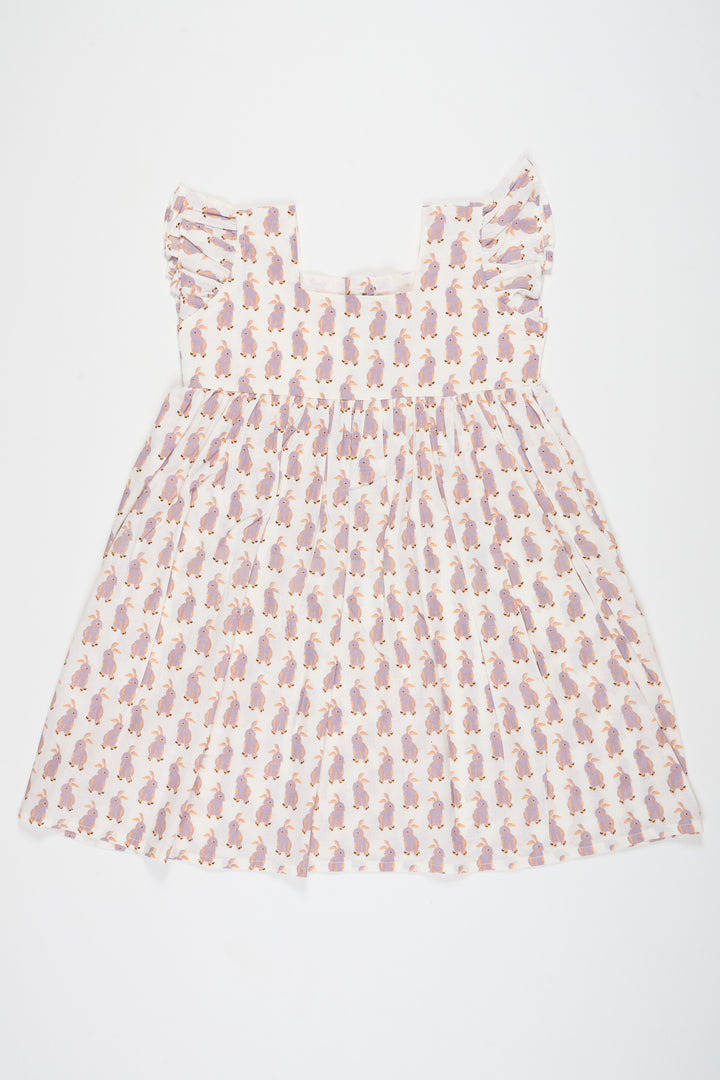 The Nesavu Baby Cotton Frocks Adorable White Baby Cotton Frock with Bunny Print and Ruffled Sleeves Perfect for Playdates Nesavu 10 (NB) / White BFJ679A-10 Nesavu White Cotton Baby Frock Bunny Print Playful Comfortable Kids Outfit