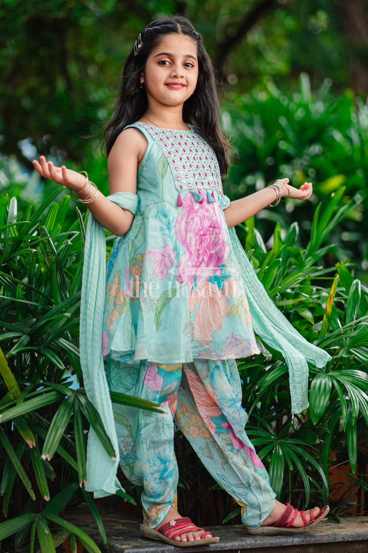 The Nesavu Girls Dothi Sets Aqua Floral Kurta and Dhoti Set for Girls with Sleeveless Kurta and Embellished Yoke Nesavu Nesavu Aqua Floral Girls Dhoti Set Sleeveless Kurta Tassel Embellishments